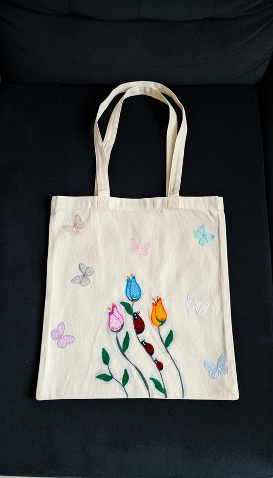 Handmade Cotton Tote, Ladybugs & Sewn Butterflies/ punch needle/ whimsical / everyday bag/ colorful floral design/ fiber art/cottagecore