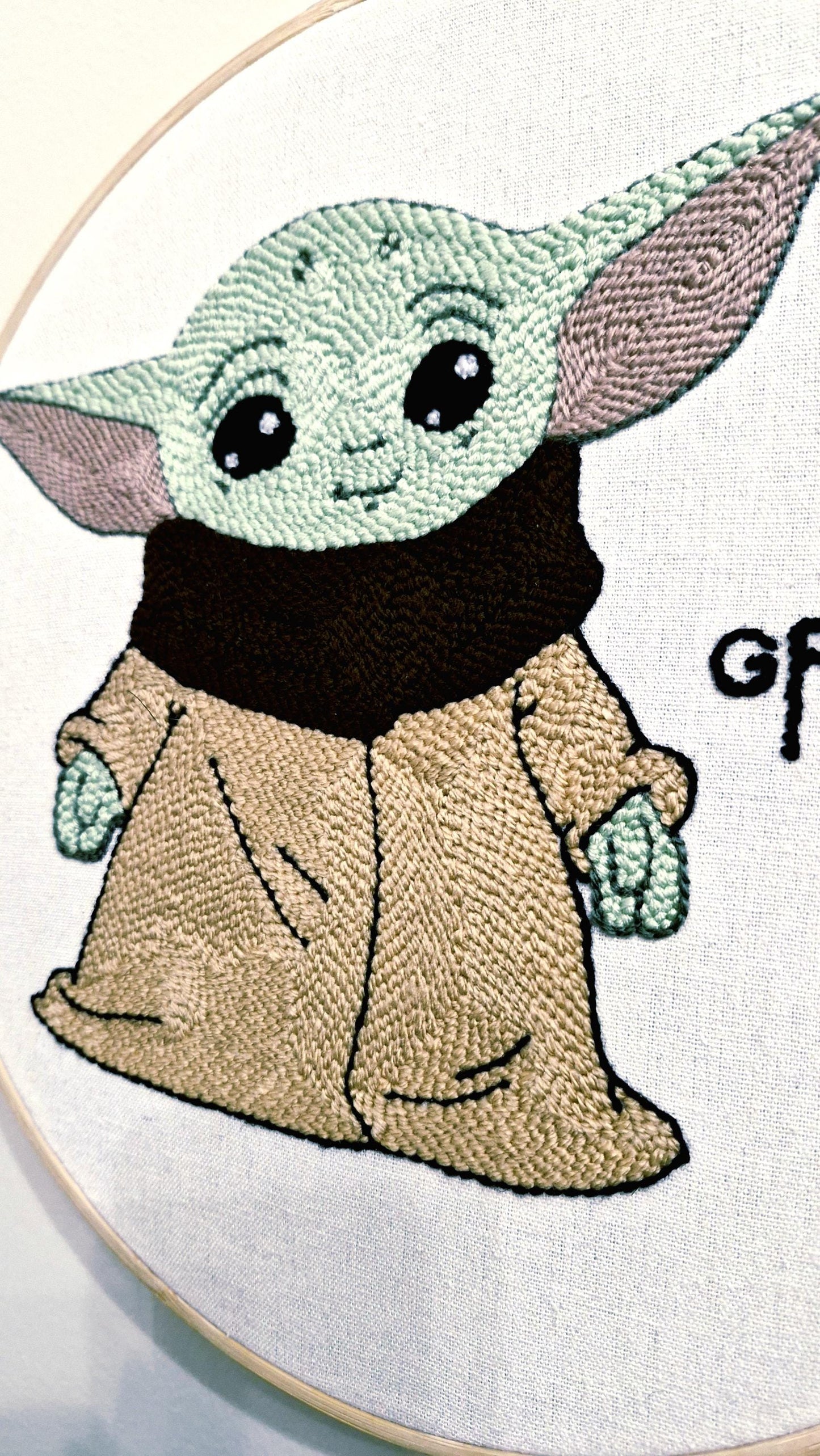 Grogu Punch Needle Wall Art – Baby Yoda Handmade Embroidery, Star Wars Inspired Decor, Nursery Wall Art, Gift for Fans, Wooden Stand Include
